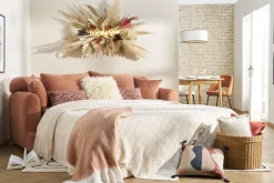 Shop Miliboo Sofá cama 3-4 plazas desenfundable con forma de judía de tejido efecto aterciopelado terracota SACHA